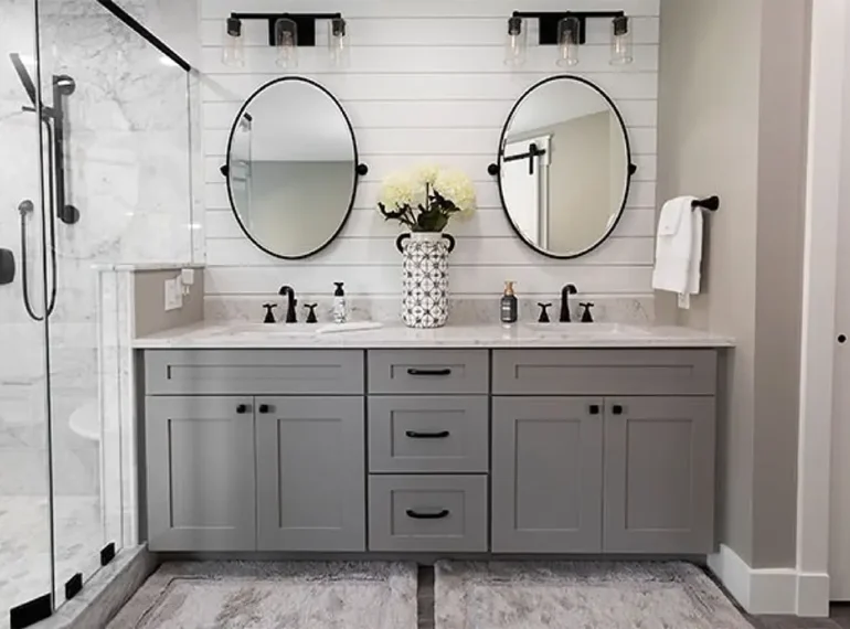 Spa-style bathroom remodel with natural tones and recessed lighting