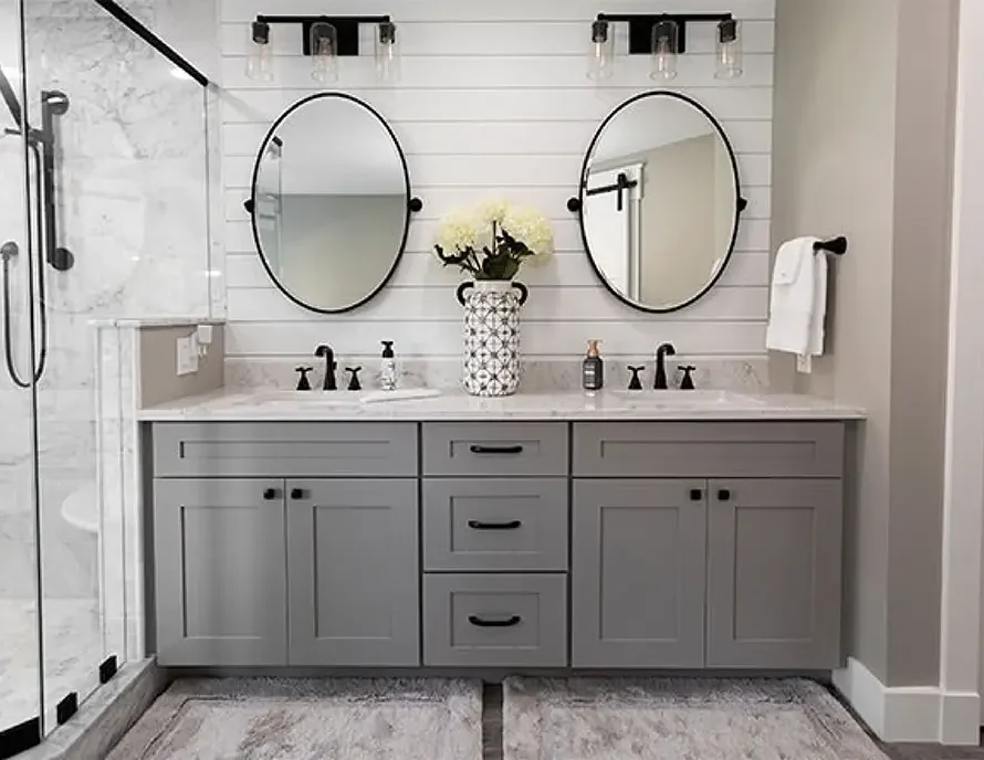 Spa-style bathroom remodel with natural tones and recessed lighting