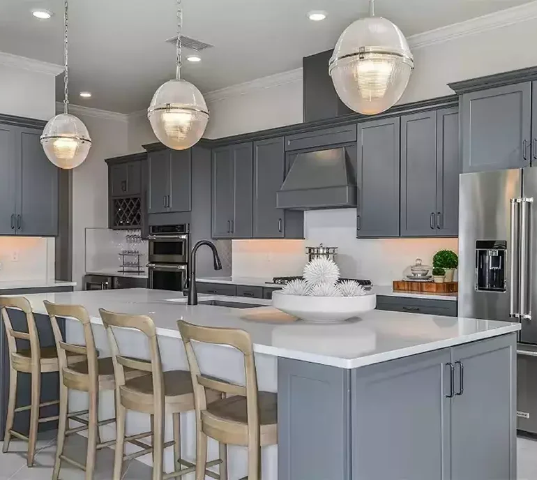 Custom kitchen with quartz countertops and stainless steel appliances