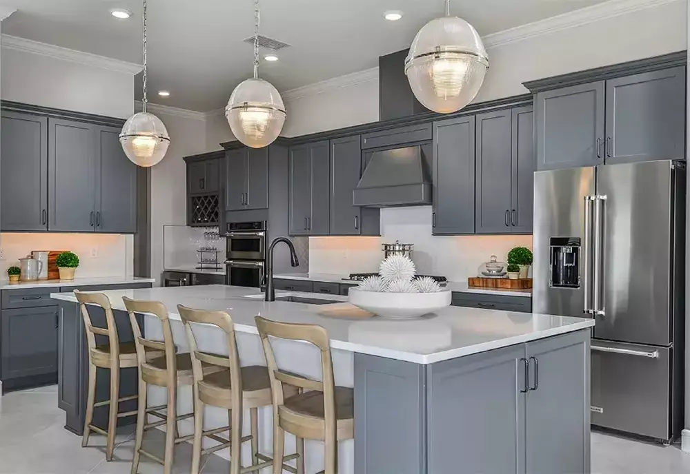 Custom kitchen with quartz countertops and stainless steel appliances