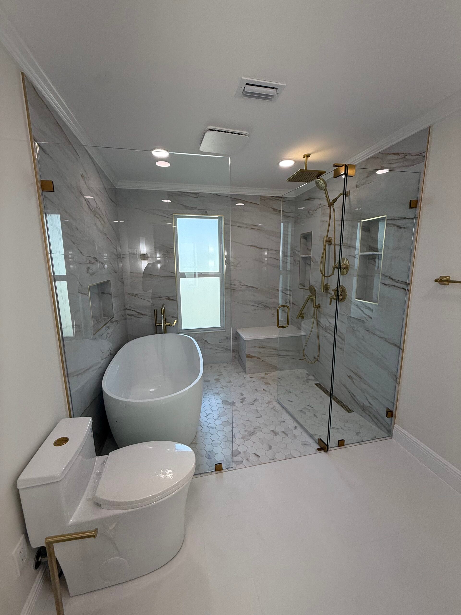 Tampa Bay bathroom renovation with custom tile by CraftLine Remodeling